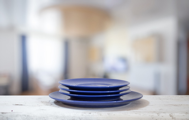 plates on white table - Photo, Image