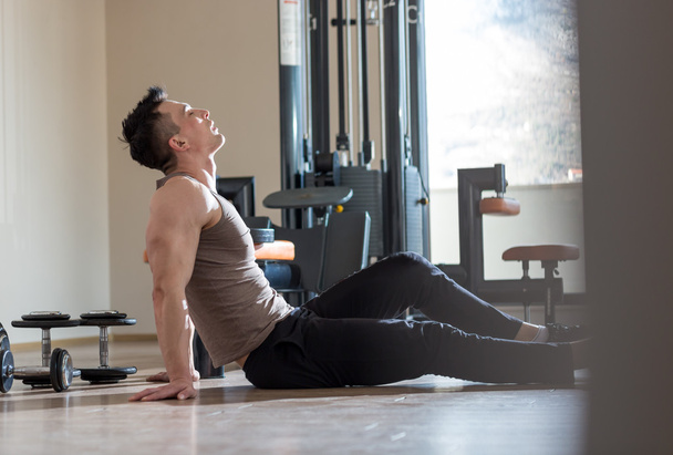 Muscular Man Resting After Exercise - Foto, Imagen
