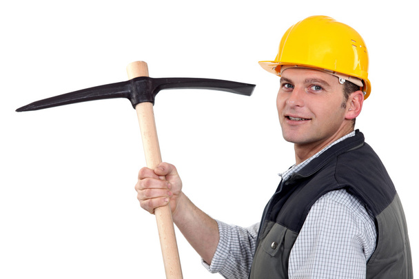 Man with pick-axe - Фото, изображение