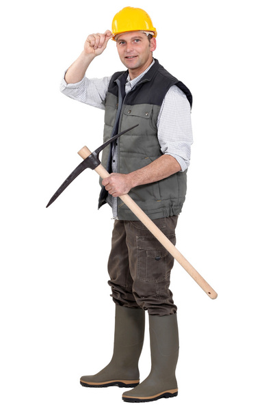 Workman with pickaxe on white background - Foto, Bild