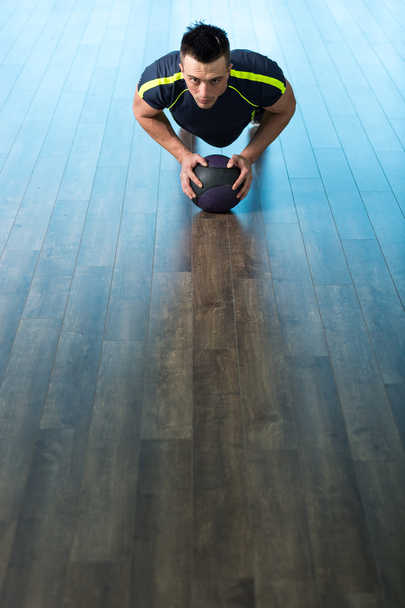 young man doing yoga indoor - Foto, Imagen