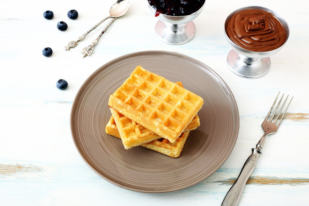 waffles on kitchen table background - Foto, afbeelding