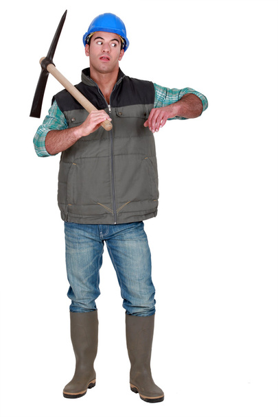 Annoyed man holding axe - Foto, Imagen