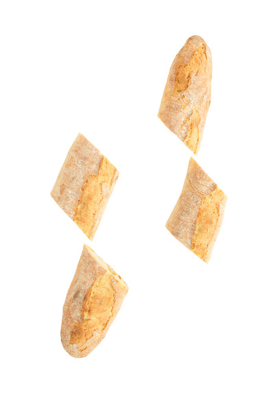 Baguete de pão francês em um fundo branco, feito de farinha. assar, vista superior, vista lateral. espaço para texto
 .. - Foto, Imagem