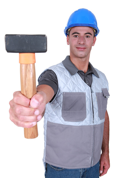 Handyman showing hammer - Fotoğraf, Görsel