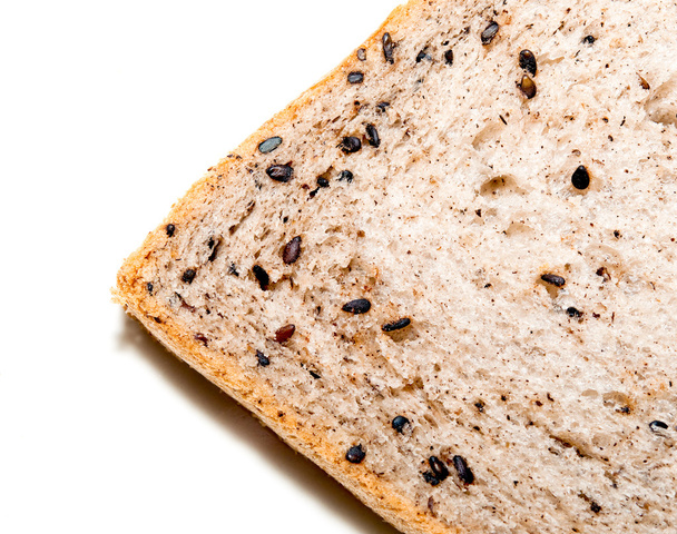 O pão fresco com sésamo preto
 - Foto, Imagem