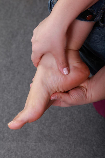 Massage pour un pied fatigué
 - Photo, image