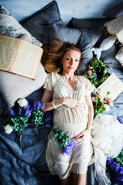 Smiling beautiful girl pregnancy Lavender, atmosphere book, Provence, retro, baroque, linen harmony idyll joy happiness love - Фото, изображение