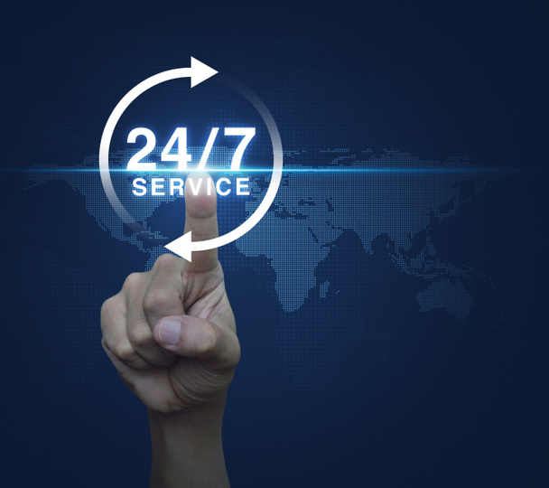 Hand drukken knop 24 uur service pictogram over digitale wereld ma - Foto, afbeelding