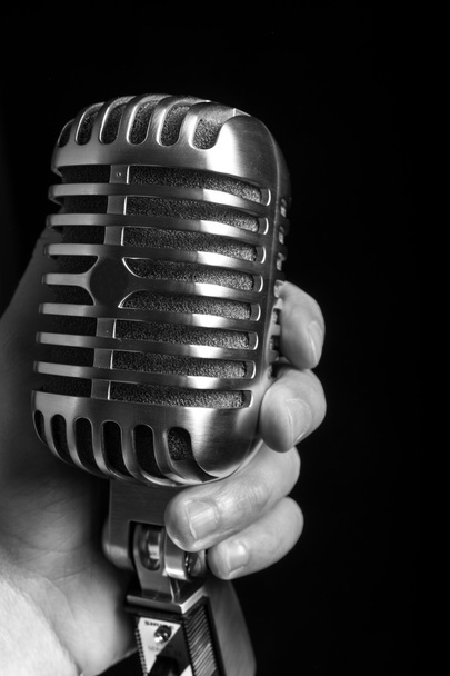 Vintage microphone on black background - Photo, Image
