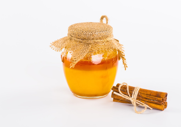 Fresh honey with nuts, lemons, still life, white background - Zdjęcie, obraz