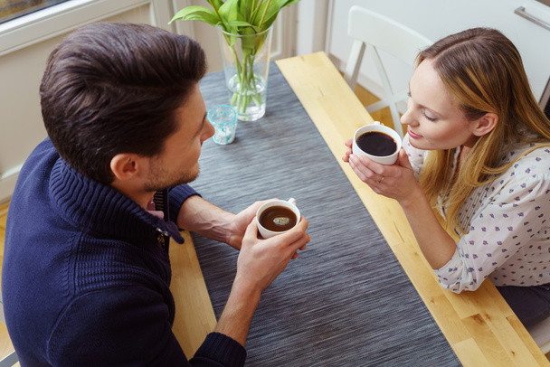 High angle view of couple drinking coffee - 写真・画像