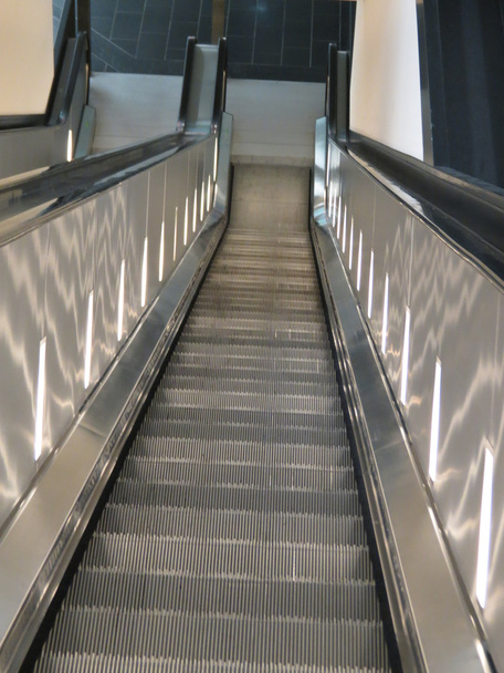 Escalator stairs to an underground station or supermarket - Photo, Image