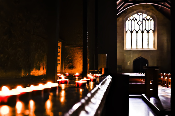 Darkroom with flashing candles  - Foto, Bild