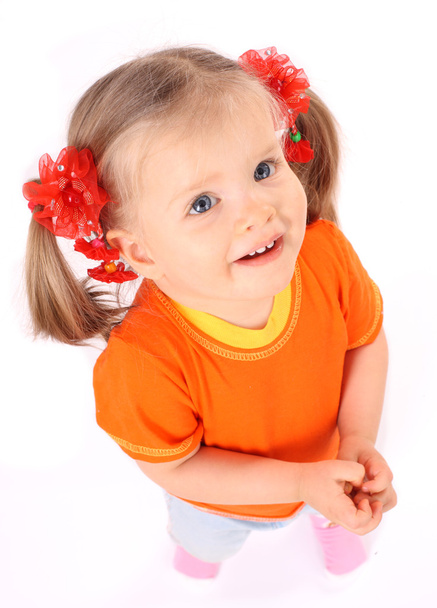 Baby girl in orange t-shirt. - Fotoğraf, Görsel