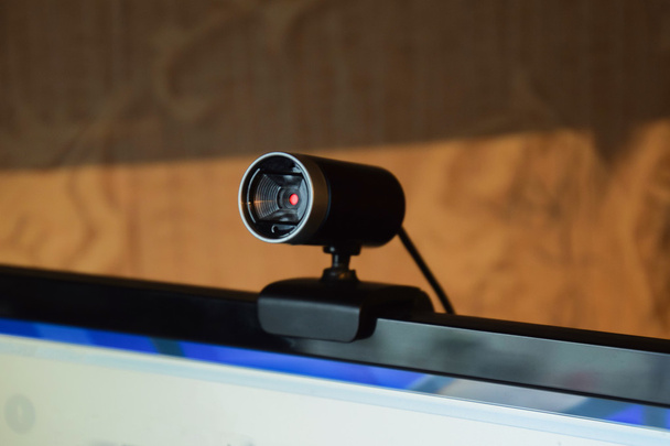 Web camera, attached to the monitor. Equipment for video. - Φωτογραφία, εικόνα