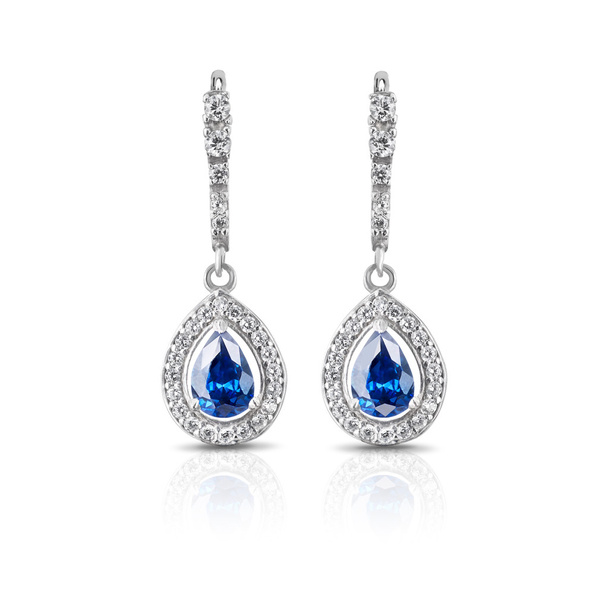 Jewelry. Silver earrings with sapphires - Photo, Image