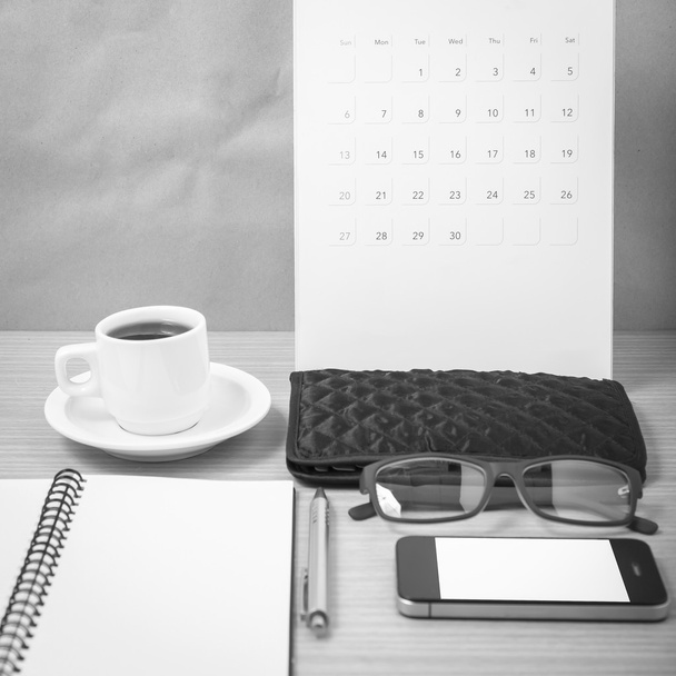 office desk : coffee with phone,calendar,wallet,notepad black an - Фото, зображення