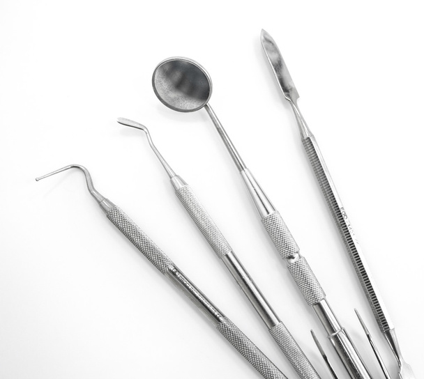 Herramientas dentistas aisladas en blanco
 - Foto, Imagen