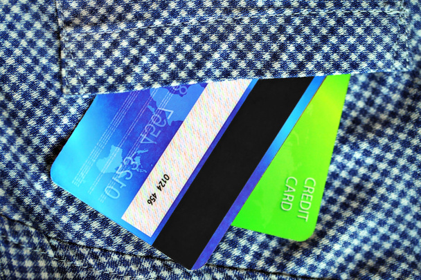 кредитні картки в кишені
  - Фото, зображення