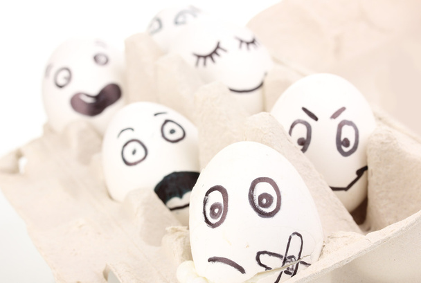 White eggs with funny faces - Foto, Imagen