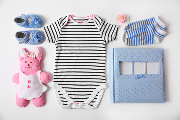 Baby clothes with toy  - Photo, image