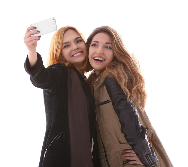 Two young women taking selfie  - Fotó, kép