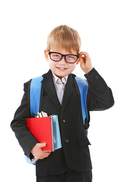 Schoolboy with backpack holding books - Foto, imagen