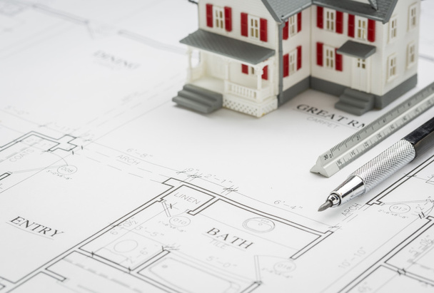 Model Home, Engineer Pencil and Ruler Resting On House Plans - 写真・画像
