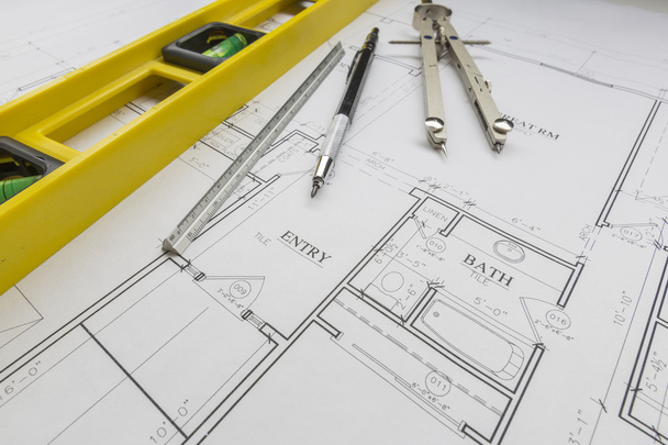Construction Level, Pencil, Ruler and Compass Resting on House P - Photo, Image
