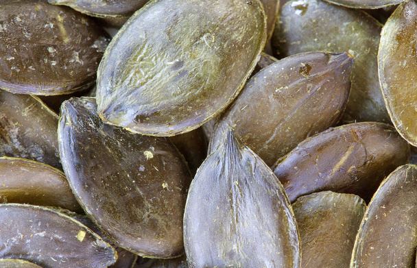 Зелене гарбузове насіння. Тло
 - Фото, зображення