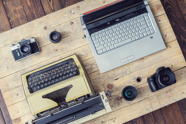 typewriter, laptop, camera and lenses - Foto, imagen