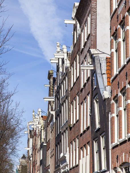 AMSTERDAM, NETHERLANDS on APRIL 1, 2016. Typical architectural details of houses XVII-XVIII of construction - Photo, Image