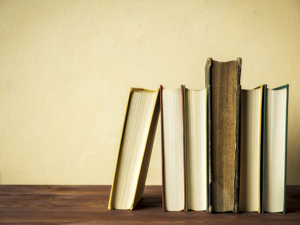 Books standing on the table - 写真・画像