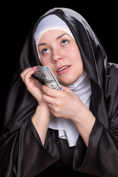 Nun with money - Фото, зображення