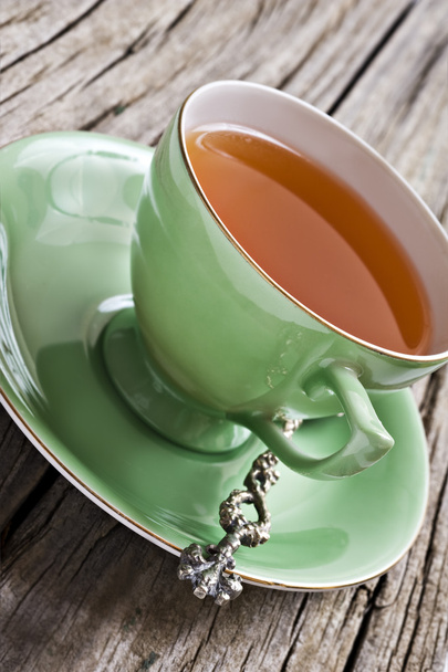 Taza de té verde antiguo con té orgánico saludable
 - Foto, Imagen