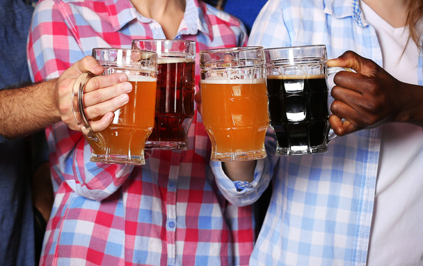 Friends drinking beer  - Фото, изображение