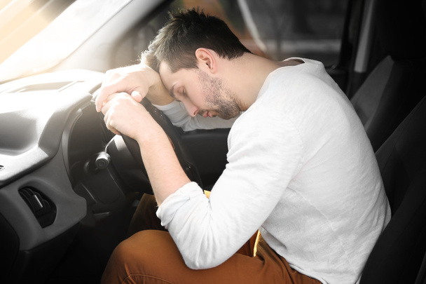 Man asleep on steering wheel  - Foto, immagini