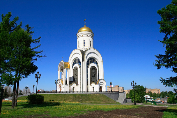 Church in park - Фото, изображение