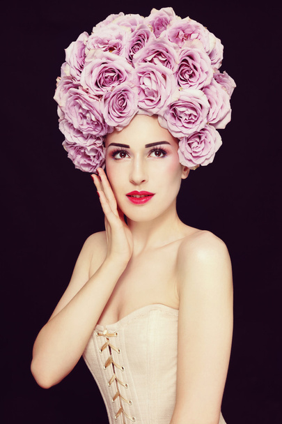 woman in with fancy roses wig - Foto, afbeelding