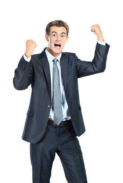Business man throwing fists in air and smiling - Foto, Imagen