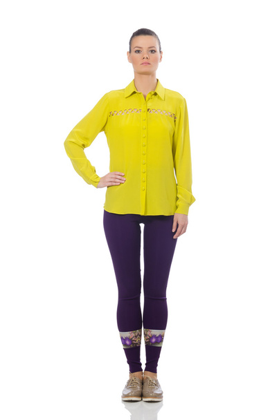 Caucasian model in purple pants and yellow blouse - Photo, Image