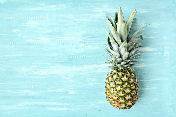 Pineapple on a blue pastel background - Fotografie, Obrázek