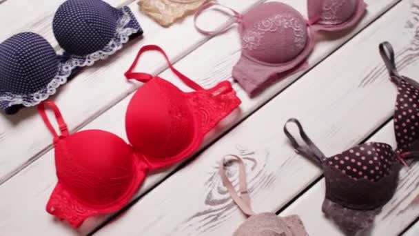 Collection of different-colored bras. - Footage, Video