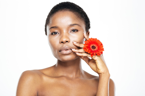 Beautiful afro american woman with flower - Fotoğraf, Görsel