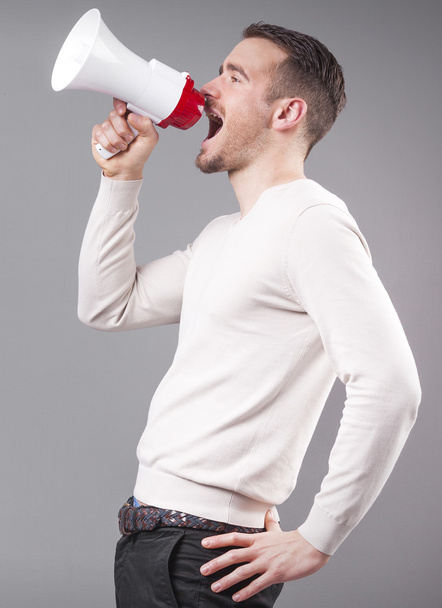 Man screaming with a megaphone  - Foto, imagen