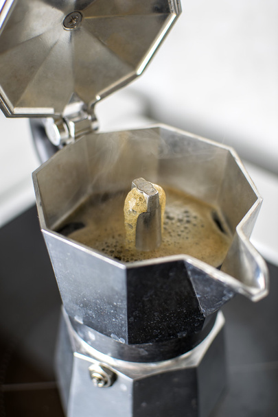 Italian vintage coffeepot on kitchen stove - Foto, imagen