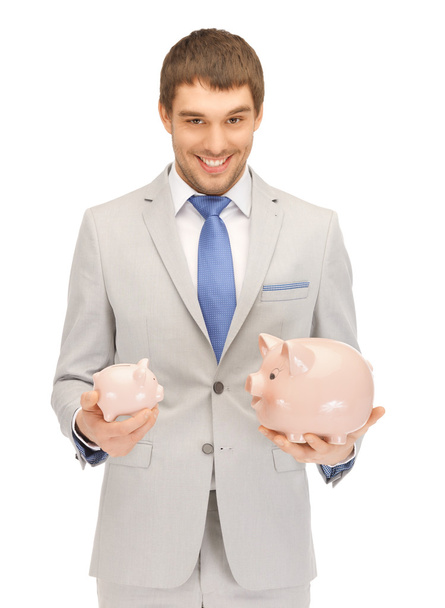 Man with piggy bank - Foto, imagen