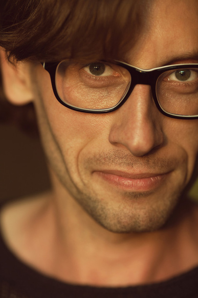 Eyewear concept. Close up portrait of charismatic man in glasses - Fotografie, Obrázek