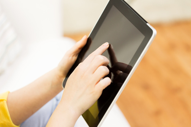 close up of woman hand with tablet pc at home - Photo, Image